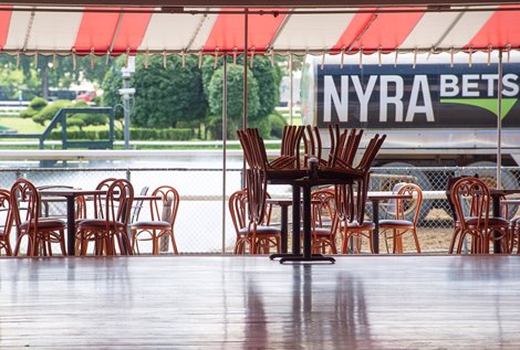 Chairs are stacked and no fans are there the day before opening day at Saratoga Race Course July 15, 2020 in Saratoga Springs, N.Y.  Photo by Skip Dickstein
