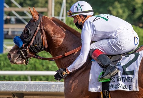 Improbable with jockey Irad Ortiz Jr. up wins the 93rd running of The Whitney Saturday Aug. 1, 2020 at the Saratoga Race Course in Saratoga Springs, N.Y.  Photo by Skip Dickstein