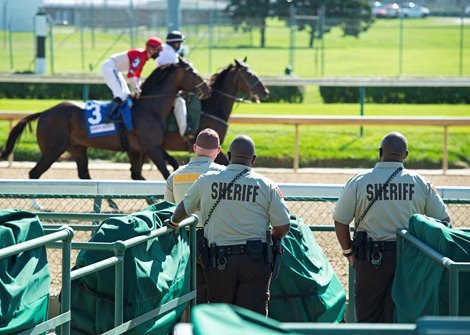 Sheriffs watch horses warming up for race. Scenes at Churchill Downs, Louisville, KY on September 5, 2020.