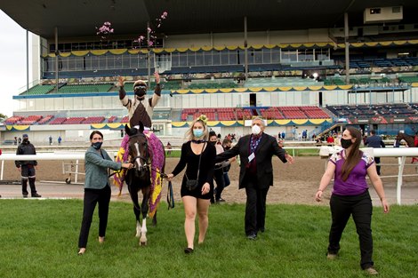 Jockey Daisuke Fukumoto guides Mighty Heart #13, (brown and beige cap silks) to victory in the $1,000,000 dollar Queen&#39;s Plate Stakes for owner Lawrence Cordes.Hall of Fame trainer Josie Carroll captures her 3rd. Queen&#39;s Plate victory. Michael Burns Photo