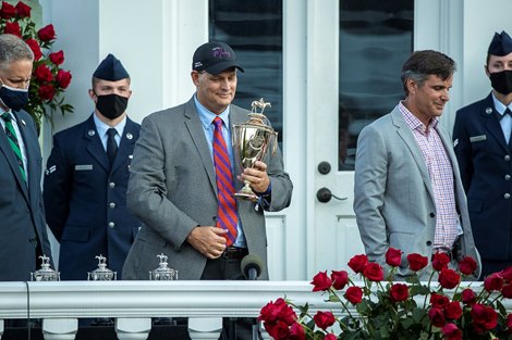 Ned Toffey, Spendthrift general manager, holds the trophy after Authentic won the Kentucky Derby at Churchill Downs in Louisville, Ky., Saturday, Sept. 5, 2020.