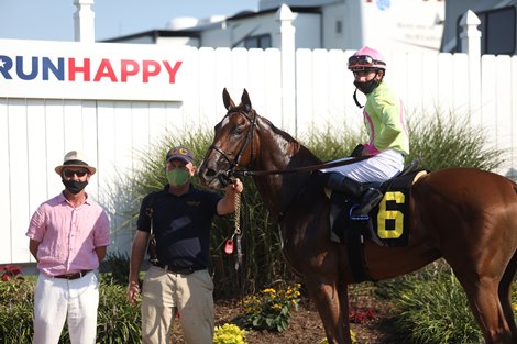 PLUM ALI wins the $500,000 Mint Juvenile Fillies at Kentucky Downs for trainer Christophe Clement, jockey Tyler Gaffalione, and owners Michael Dubb, Madaket Stables, and Bethleham Stables. Photos by Grace Clark/Kentucky Downs