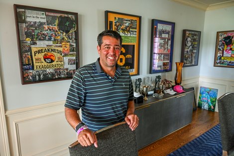 Sol Kumin stands in his dining room at his home, adjacent to the Oklahoma Training Center on August 14, 2020 in Saratoga Springs, NY  