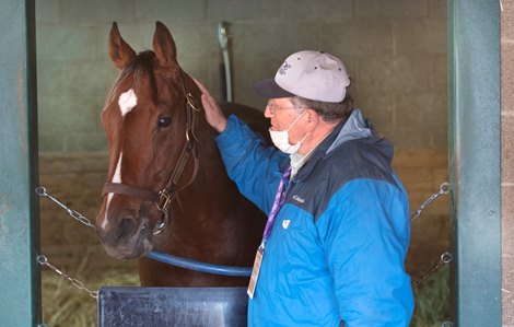 Bell’s the One with her trainer Neil Pessin stands in her stall at Keeneland Race Course Thursday Nov. 5 2020 in Lexington, KY.