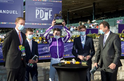 Winning connections of Order of Australia in the winner’s circle for the Breeders’ Cup Mile at Keeneland in Lexington, Ky. on Nov. 7, 2020.