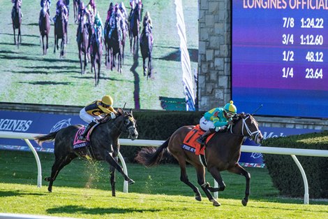 Fire At Will ridden by Ricardo Santana Jr.wins the $1M Juvenile Turf(G1) Presented by Coolmore at Keeneland Race Course Friday Nov. 6 2020 in Lexington, KY