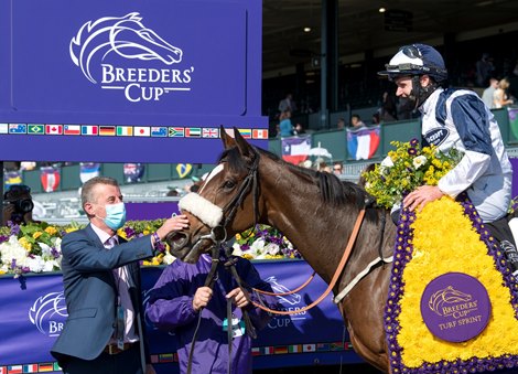 Winning connections of Glass Slippers with Tom Eaves in the winner’s circle for the Turf Sprint at Keeneland in Lexington, Ky. on Nov. 7, 2020.