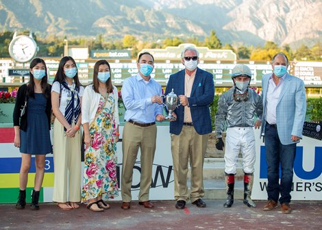 Calvin Nguyen's Idol and jockey Joel Rosario, outside, overpower Express Train (Juan Hernandez), inside, to win the Grade I, $400,000 Santa Anita Handicap, Saturday, March 6, 2021 at Santa Anita Park, Arcadia CA.<br>
© BENOIT PHOTO