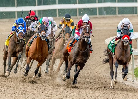 3/20/2021  -  Hot Rod Charlie 9 right) with Joel Rosario aboard leads the pack into the stretch and goes on to win the 108th running of the $1,000,000  Grade II Louisiana Derby at Fair Grounds.  Hodges Photography / Jan Brubaker