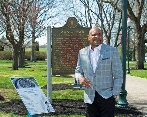 in front of plaques for the Man o’ War statue by the Isaac Murphy Memorial Garden Ron Mack with Legacy Equine Academy at the Kentucky Horse Park  in Lexington, Ky., on March 30, 2021. 