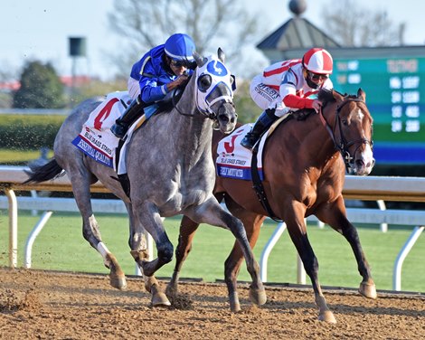 April 3, 2021: Essential Quality, Luis Saez up, holds off Highly Motivated to win the 97th running of the Gr.2 Blue Grass Stakes...<br><br />
&#169; Rick Samuels/The Blood-Horse