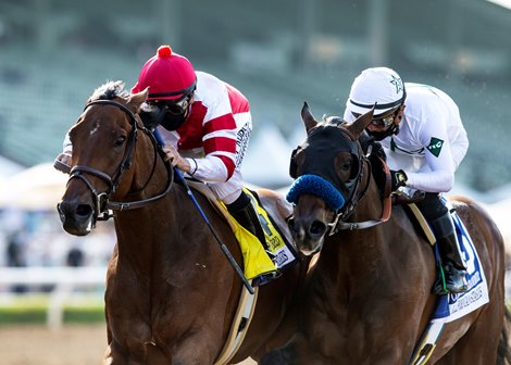 Royal Ship and jockey Mike Smith, left, outleg Country Grammer (Abel Cedillo), right, to win the G2, $200,000 Californian Stakes, Saturday, April 17, 2021 at Santa Anita Park, Arcadia CA.