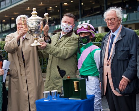 (L-R): John Chandler, with Juddmonte, presenter Dermot Ryan with Coolmore, Tyler Gaffalione, and Coolmore presenter Dick Brodie. Juliet Foxtrot with Tyler Gaffalione wins the Coolmore Jenny Wiley (G1)<br>
at Keeneland near Lexington, Ky., on April 10, 2021. 