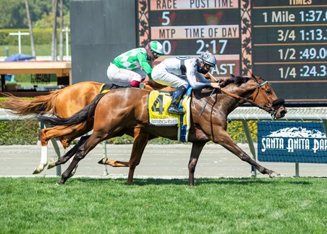 Going Global and jockey Flavien Prat, outside, hold off Closing Remarks (Umberto Rispoli) to win the Grade III $100,000 Providencia Stakes Saturday, April 3, 2021 at Santa Anita Park, Arcadia, CA