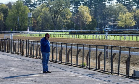 Glen Kozak, vice president of Operations and Capital Projects for NYRA looks over the main track at the Saratoga Race Course Monday April 19, 2021 in Saratoga Springs, N.Y. as horses for the first time in recent memory take to the this early in the year to train.  The reason for the early opening of the venue is the ongoing extensive renovation of the Oklahoma Training Center which is normally is the first to open for training early in the spring of the year..   Photo by Skip Dickstein