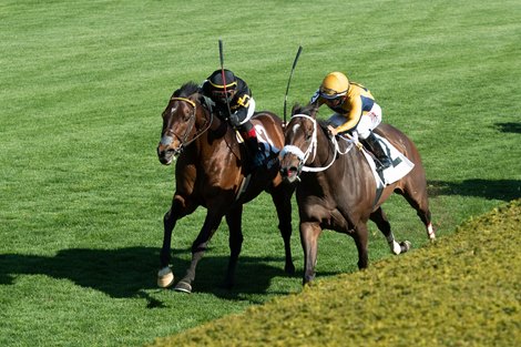 Bound for Nowhere and Joel Rosario (black silks) win the Shakertown Stakes (G2) at Keeneland on April 3, 2021.