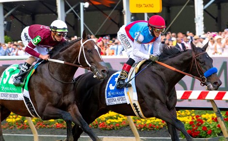 (L-R): Midnight Bourbon and Medina Spirit race during the Preakness (G1) at Pimlico in Baltimore, Maryland on May 15, 2021.