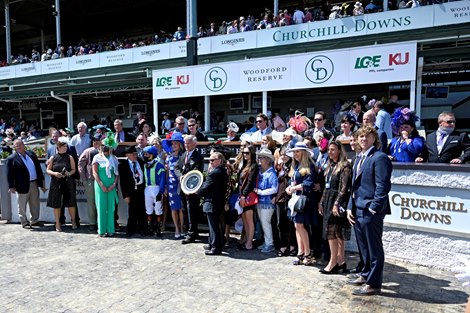 Owners and Trainers celebrate after Jackie&#39;s Warrior ridden by jockey Joel Rosario won the Pat Day Mile Stakes (G2) at Churchill Downs, Saturday, May 1, 2021 in Louisville, KY. 