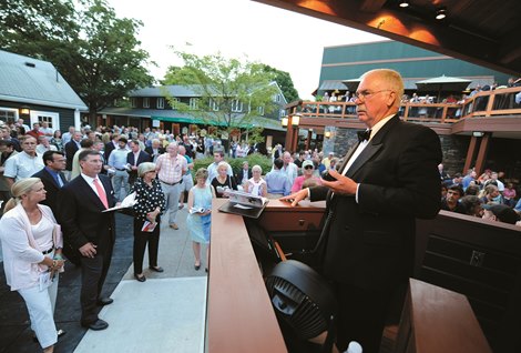 Bid spotter and auctioneer Steve Dance watches for bidders in the rear of the Fasig-Tipton Sales Pavilion in the first of two sessions of the annual yearling sales in Saratoga Springs, New York August 2, 2010.    