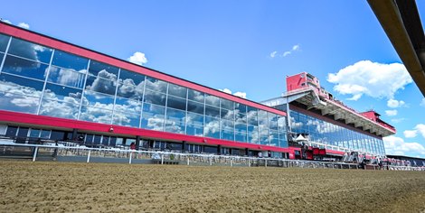 Clouds reflect from clubhouse windows at Pimlico Raceway Friday, May 14, 2021 in Baltimore, MD