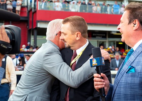 (L-R): Todd Pletcher hugs Mike McCarthy after Rombauer with Flavien Prat win the Preakness (G1) at Pimlico in Baltimore, Maryland on May 15, 2021.