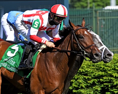 Domestic Spending #5 ridden by jockey Flavien Prat and Colonel Liam #3 ridden by jockey Irad Ortiz Jr. battled to a Dead Heat finish in the Old Forester Bourbon Turf Classic Stakes (G1T) at Churchill Downs, Saturday, May 1, 2021, in Louisville, KY.  <br>
