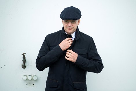 Aidan O&#39;Brien buttons up as the rain continues to fall<br><br />
Epsom 4.6.21