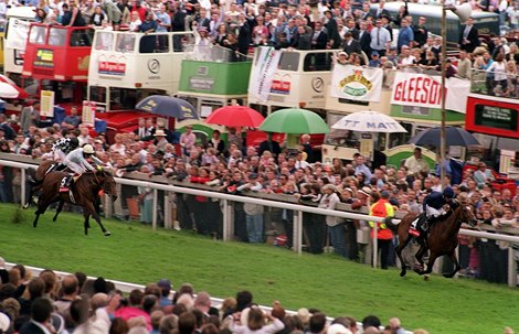 Galileo (Mick Kinane) scorches to victory in the Derby from Golan (Pat Eddery) 