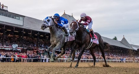 Essential Quality,  with jockey Luis Saez duels with Midnight Bourbon with jockey Luis Saez, right to win the 152nd Runhappy Travers Stakes at the Saratoga Race Course Saturday Aug 28, 2021 in Saratoga Springs, N.Y.<br><br />
