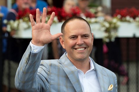 Trainer Chad Brown holds up five fingers after his fifth win on the card at the Saratoga Race Course Wednesday Aug 28, 2021 in Saratoga Springs, N.Y.  His trainee Serve the King with jockey Irad Ortiz Jr. out dueled Ry’s the Guy with jockey Luis Saez to the wire to win the 17th running of The John’s Call at the Spa.   Photo Special to the Times Union by Skip Dickstein