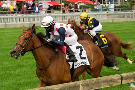 Jockey Patrick Husbands guides Our Flash Drive to victory in the $150,000 Ontario Colleen Stakes for owner Live Oak Plantation and trainer Mark Cassel.