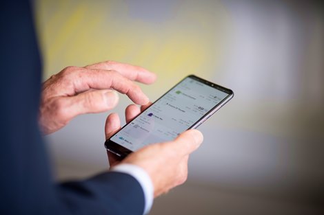 Betting on a smart phone<br><br />
York 19.8.21 Pic: Edward Whitaker