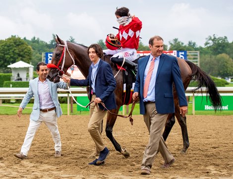 Nick Martinez, Andres Gutierrez and Fausto Gutierrez join Letruska with Irad Ortiz Jr. after win of the Personal Ensign Stakes (G1) at Saratoga Race Course in Saratoga Springs, N.Y., on Aug. 28, 2021.