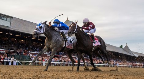 Essential Quality,  with jockey Luis Saez duels with Midnight Bourbon , right to win the 152nd Runhappy Travers Stakes at the Saratoga Race Course Saturday Aug 28, 2021 in Saratoga Springs, N.Y.  <br><br />
