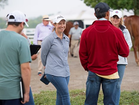 LIz Crow with some of her team looking at horses<br>
Keeneland September yearling sales on Sept. 16, 2021. 