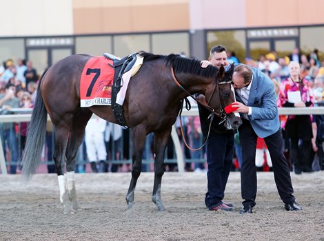Trainer Doug O&#39;Neill kisses Hot Rod Charlie after he won the $1,000,000 Grade 1 Pennsylvania Derby at Parx Racing in Bensalem, Pennsylvania on September 25, 2021. Photo By Nikki Sherman/EQUI-PHOTO