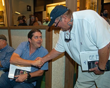 (L-R): Ron Winchell and Greg Goodman after sale of HIp 177 colt by Into Mischief out of Superioritycomplex at Mt. Brilliant <br><br />
Keeneland September yearling sales on Sept. 13, 2021.
