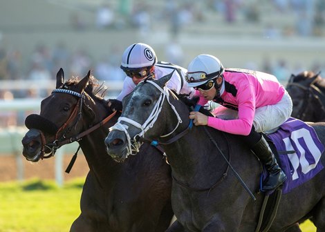Gary Barber&#39;s Liam&#39;s Dove and jockey Kyle Frey, right, hold off Helens Well (Flavien Prat) to win the $100,000 Del Mar Juvenile Fillies Turf Sunday, September 5, 2021 at Del Mar Thoroughbred Club in Del Mar, CA. Benoit Photo
