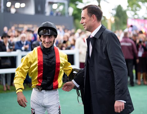 Torquator Tasso (Rene Piechulek) and trainer Marcel Weiss  after winning the Prix de l'arc de Triomphe<br>
Longchamp 3.10.21 Pic: Edward Whitaker