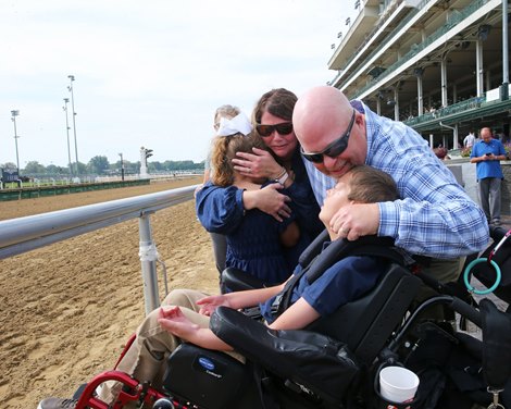 Cody Dorman and his family watch Cody's Wish win in a maiden special weight Saturday, October 2, 2021 at Churchill Downs