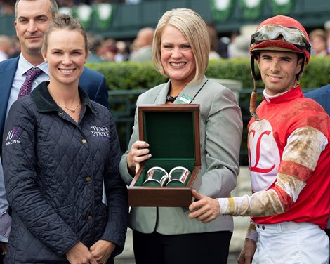 (L-R): Assistant Tessa Bisha, presenter Tia Murphy, and Florent Geroux He’smyhoneybadger with Florent Geroux wins the Perryville at Keeneland on Oct. 23, 2021. 