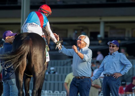 Trainer Bob Baffert, right, celebrates with jockey John Velazquez, left, after Medina Spirit&#39;s victory in the Grade I, $300,000 Awesome Again, Saturday, October 2, 2021 at Santa Anita Park, Arcadia CA.<br><br />
&#169; BENOIT PHOTO