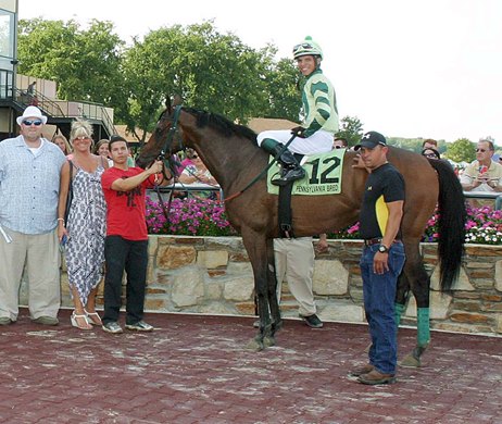 Trainer Marcos Zulueta at Parx Racing in the winner&#39;s circle with Uncle Dave<br><br />
August 29, 2015