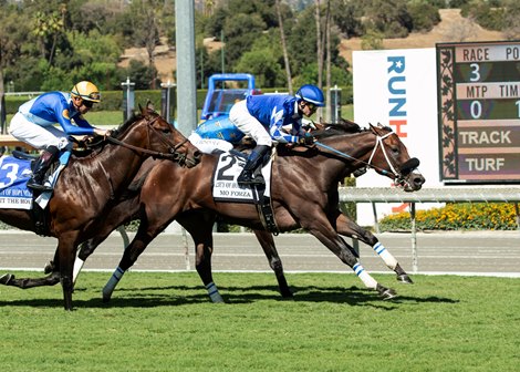 Mo Forza and jockey Flavien Prat, right, outleg Hit the Road (Florent Geroux), left, and Smooth Like Strait (Umberto Rispoli), inside, to win the G2, $200,000 City of Hope Mile, Saturday, October 2, 2021 at Santa Anita Park, Arcadia CA.