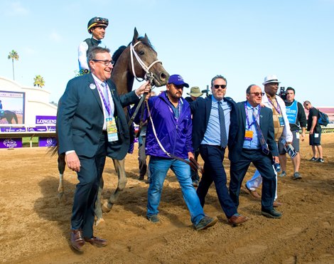 Aron Wellman, Wayne Catalano and winning connections after Aloha West with Jose Ortiz win the Sprint (G1) at Del Mar on November 6, 2021.