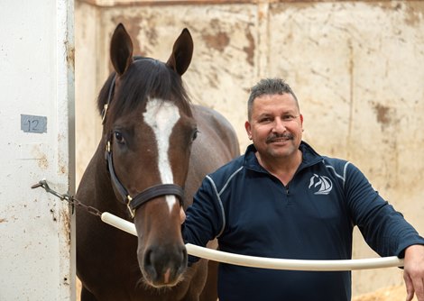 Hot Rod Charlie with his groom Wednesday Nov. 3, 2021 at the Del Mar Race Track in San Diego, CA. Photo by Skip Dickstein