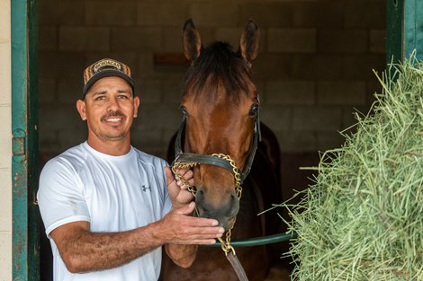 Groom, Jose Perez with Art Collector Tuesday Nor. 2, 2021 at the Del Mar Race Track in San Diego, CA. Photo by Skip Dickstein