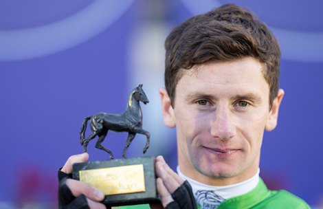 Oisin Murphy holds his trophy after winning the Distaff on Marche Lorraine Del Mar 6.11.21 