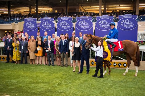 Winning connections in the winner’s circle after Modern Games with William Buick win the Juvenile Turf (G1T) at Del Mar on November 5, 2021.