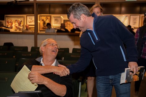 Hip 224D Paris Lights, a broodmare or racing prospect by Curlin out of Paris Bikini was purchased by Ned Toffey, left from ELiTE Sales Bradley Weisbord, right for $3.1M at the Keeneland November Breeding Stock Sale in Lexington, Ky., on Nov. 10, 2021. 